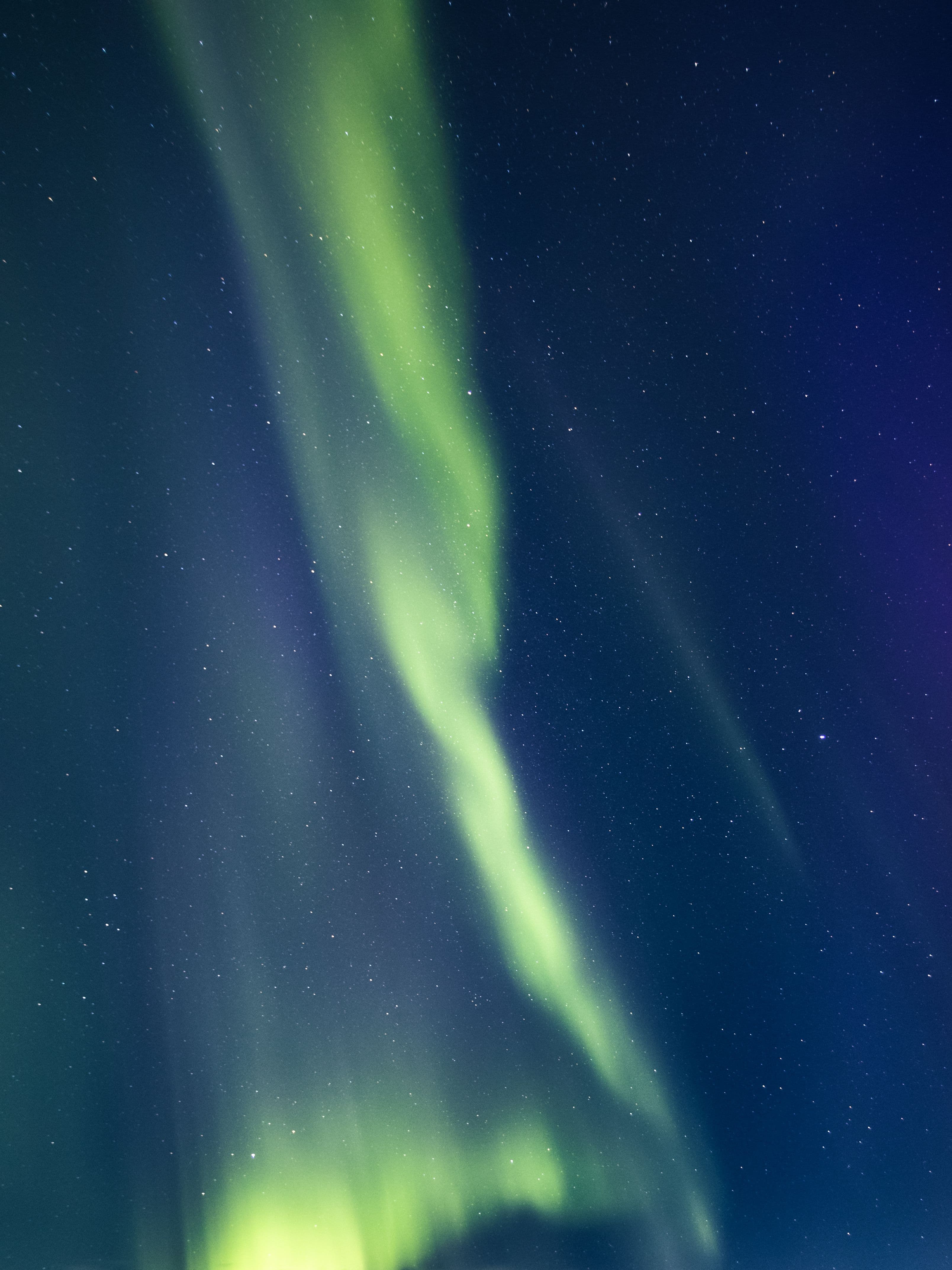 Aurora borealis and stars in the night sky